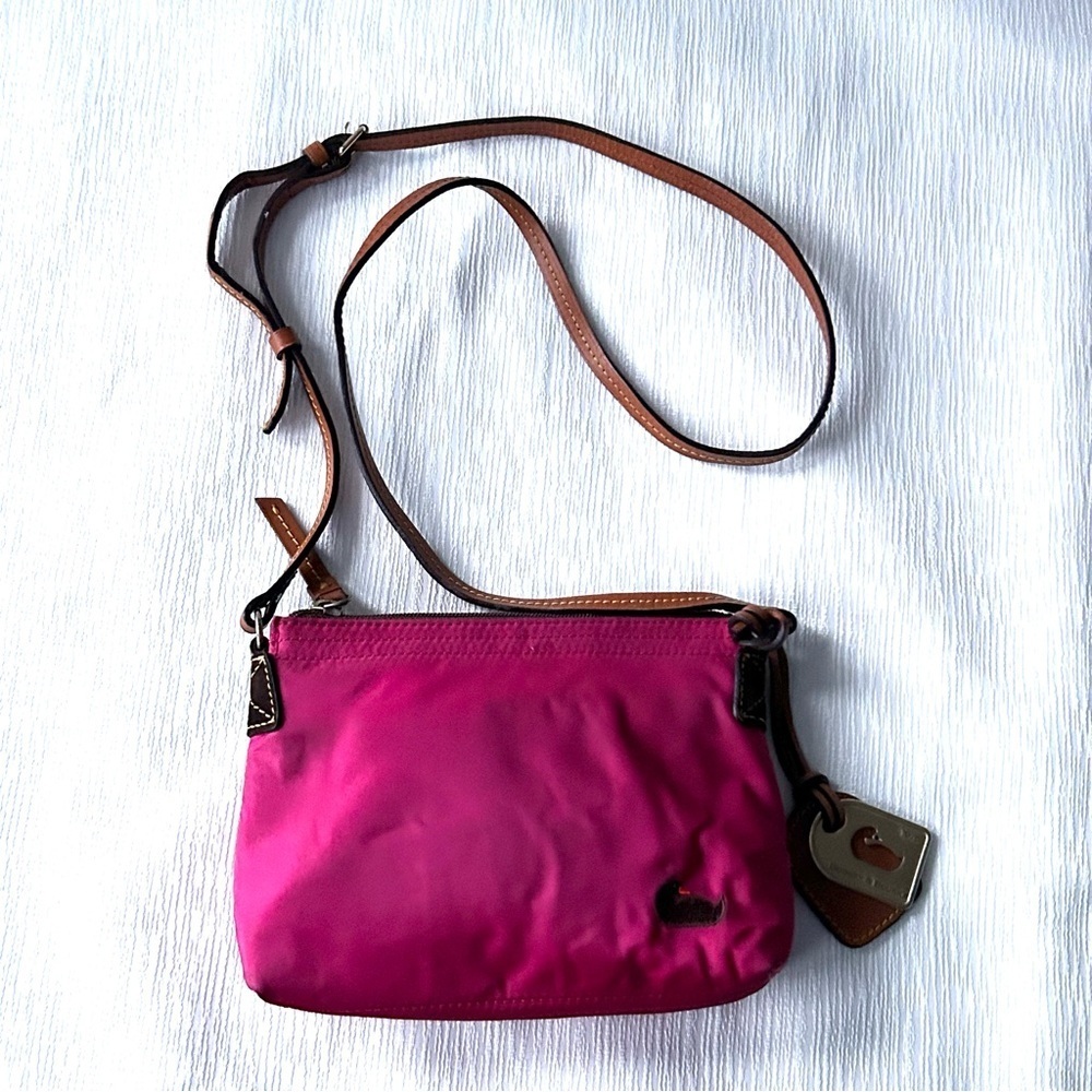 Dooney and Bourke vibrant pink crossbody bag